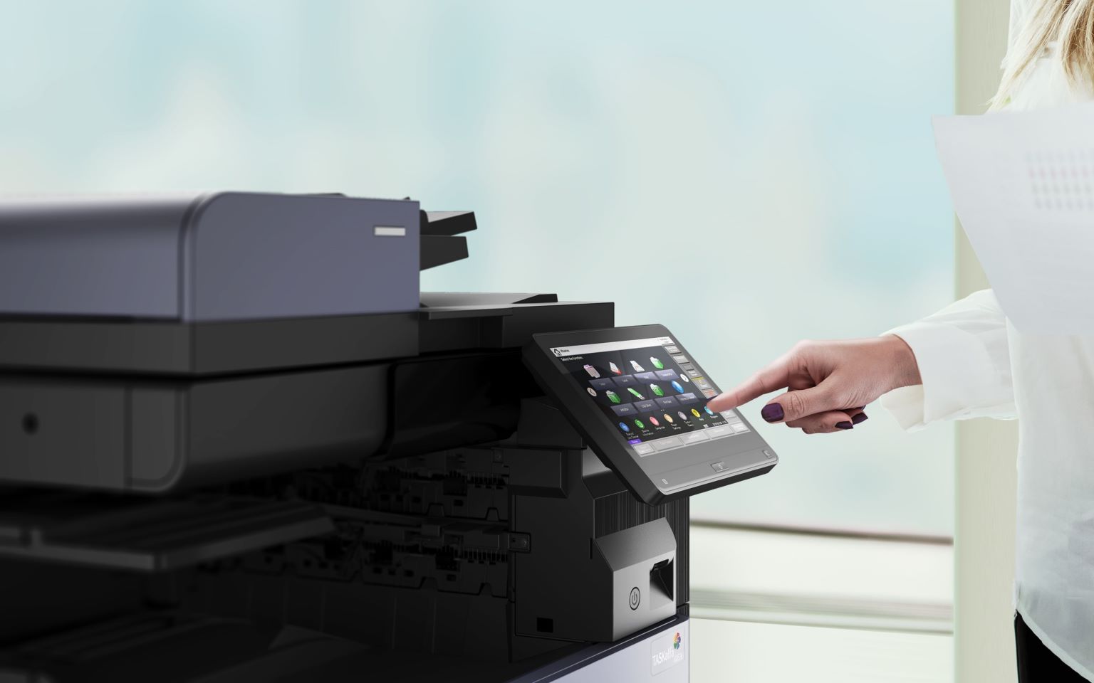 Businesswoman using multifunction printer